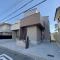 【大阪府/高槻市日吉台六番町】高槻市日吉台六番町　新築戸建1号地 建築中の外観：全二区画右側