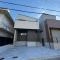 【大阪府/高槻市日吉台六番町】高槻市日吉台六番町　新築戸建2号地 建築中の外観：全二区画 左側
