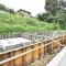 【神奈川県/横浜市神奈川区菅田町】神奈川区菅田町新築戸建2号棟（全12区画） 建築中の外観：全12区画　写真中央
