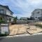 【東京都/町田市小山町】町田市小山町　新築戸建1号棟 建築中の外観：全2棟／写真中央