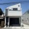 【東京都/立川市柴崎町】立川市柴崎町　1号棟　新築戸建 建築中の外観：全3棟現場（写真中央）