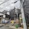 【東京都/小平市花小金井】小平市花小金井5丁目　全2棟　B号棟 建築中の外観：写真中央（全2棟）