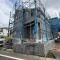 【神奈川県/川崎市高津区向ケ丘】高津区向ヶ丘新築戸建て14号棟 建築中の外観：全15号棟　写真中央