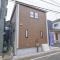 【埼玉県/入間市東藤沢】入間市東藤沢5丁目　1号棟 建築中の外観：全4区画/写真中央