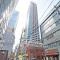 【大阪府/大阪市中央区南本町】ブランズタワー大阪本町 外観：写真中央のマンション