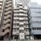【東京都/港区芝浦】ローレルプラザ田町 外観：画面中央の建物
