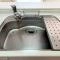 【東京都/稲城市矢野口】日神パレステージ京王よみうりランド 浄水器一体型水栓を備えたキッチンシンク