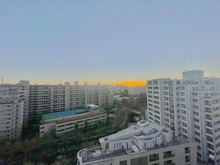 【東京都/板橋区加賀】プラウドシティ加賀学園通り 眺望：バルコニー南西側から夕方に撮影(ズームなし)