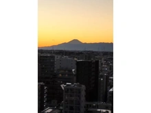【神奈川県/川崎市幸区中幸町】クレッセント川崎タワー 眺望：ズームあり。夕焼けと富士山