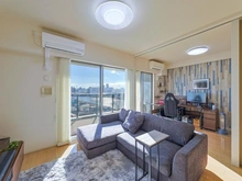 【東京都/足立区新田】ファインシティ王子神谷リバー＆フォレスト リビング・ダイニング：写真奥は約5.0帖の洋室（スライドドア開扉時）