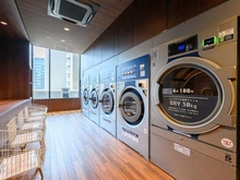 【神奈川県/横浜市神奈川区鶴屋町】THE YOKOHAMA FRONT TOWER 共用施設：ランドリー