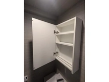 【東京都/中央区築地】東銀座ロイアルハイツ トイレ：トイレ内の収納付き三面鏡