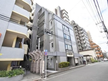 【神奈川県/川崎市川崎区池田】コスモ川崎シティウイング 外観：写真中央の建物