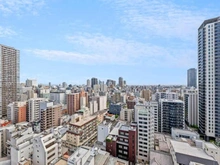 【大阪府/大阪市西区新町】ジオ新町 高層マンションが建ち並ぶ都会的な街並み。一部視界が抜け、晴れた日には気持ちのよい青空を感じられます。