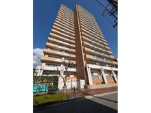 【兵庫県/神戸市灘区弓木町】ラ・トゥール六甲　イースト棟 RC造地上21階建てマンション。落ち着いたブラウン系の外観が、上品で洗練された雰囲気を感じさせます。